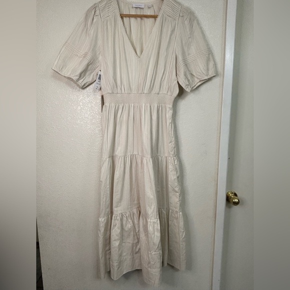 Aritzia Little Moon
Bask Dress Matte Pearl size Medium - Picture 8 of 14